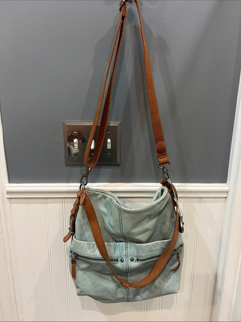 The Sak Light Teal Leather Hobo Bag with Brown Straps